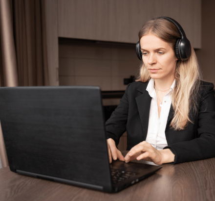 A linguist follows a QC checklist in Polish Subtitling Services, checking glossary terms, reading speed and line breaks.
