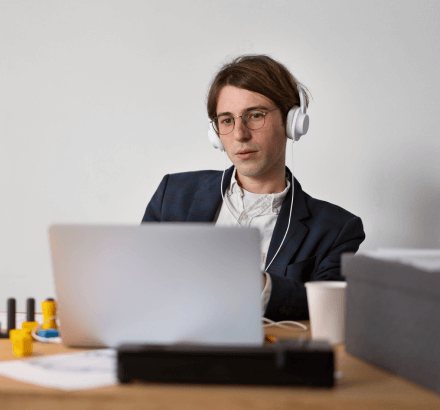 Business man using Bahasa subtitling for business, education & media help organization communicate with Indonesian audiences.