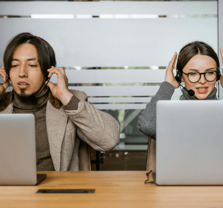 A man and woman provides sermon captioning services that create an inclusive worship experience for the hearing impaired.