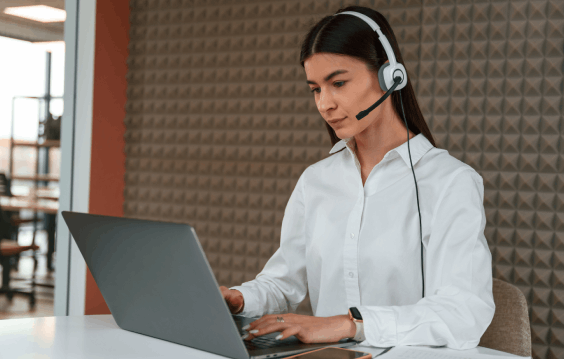 The captioner creates precise captions for a client using closed captioning services in Norfolk for media accuracy.