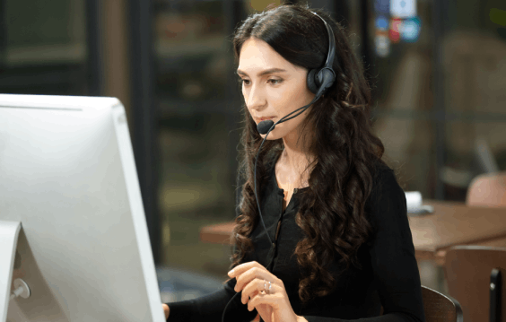 A captioner adding accurate subtitles using Closed Captioning Services for Detroit based media content.