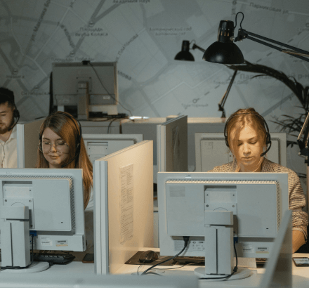 Captioning team working on corporate captioning services in French tailored for business communications.