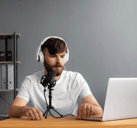 A media man using content through Descriptive Video and Closed Captioning Services in Tacoma, Washington.