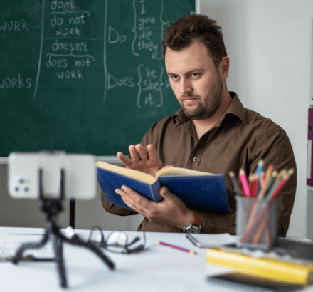 E-learning developer uses Estonian  for instructional videos, ensuring educational accessibility and clear messaging.