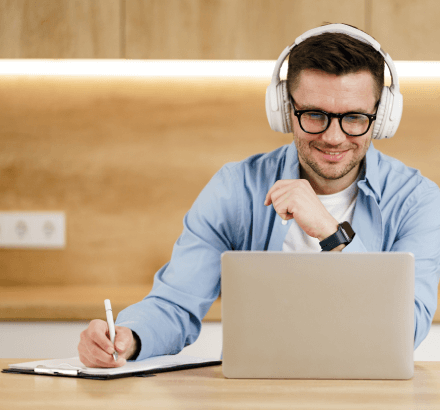 Student benefits from Greek subtitling in educational content to enhance language comprehension and learning.
