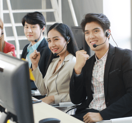 Team engaged in conversation for diverse needs for specialized Japanese media subtitling services available worldwide.