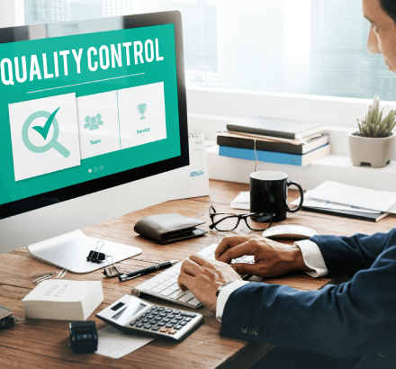 Quality specialist verifying offline captioning accuracy, synchronicity, and placement for CVAA requirements