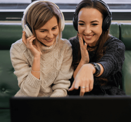 Happy clients reviewing offline captioning services backed by 100% satisfaction guarantee and professional quality assurance