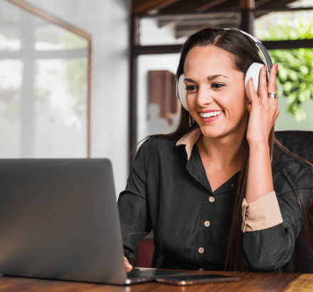 A manager checks a competitor quote for Netflix Captioning Services price-match, verifying the same scope and deliverables.