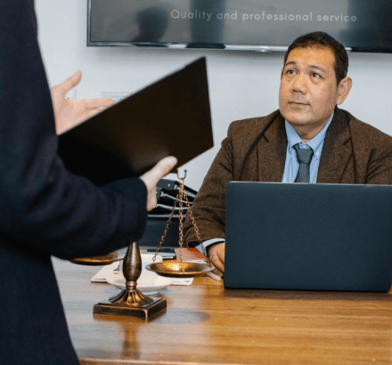 A lawyer discussing a russian captioned legal documents of Russian captioning that provide accurate for legal proceedings.