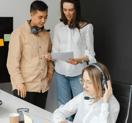 Professionals working on Spanish to English closed captioning services, ensuring cultural nuances and expert translation.