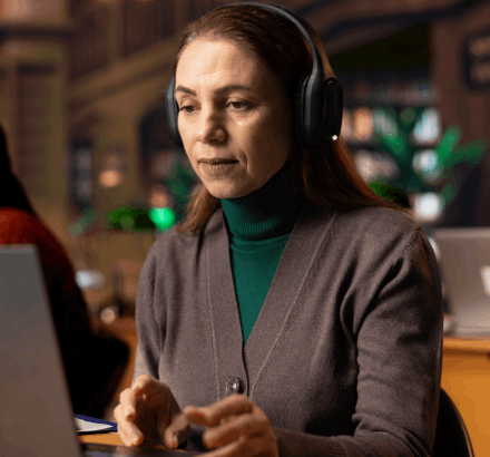 Subtitler creating multilingual subtitles using closed captioning services in Maryland to enhance viewer understanding.
