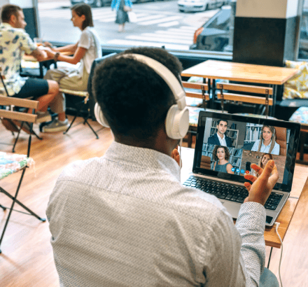 Customer accessing multilingual tutorials with video captioning services in various languages.