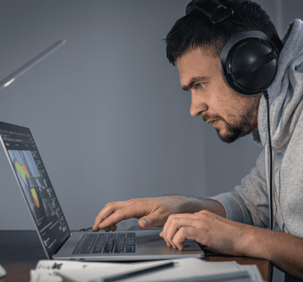 A professional captioner providing closed captioning for video, to ensure high-quality, for deaf and hard-of-hearing viewers.