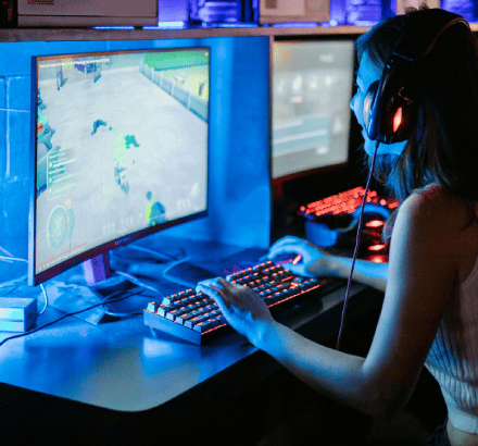 A captioner working on adding closed captioning to a video game, ensuring accessibility and enjoyment for all players.