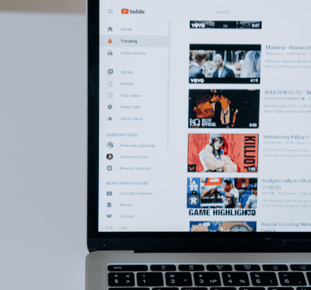 Customer watching video with closed captioning on YouTube, enhancing their viewing experience and ease of understanding.